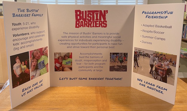 Bustin' Barriers tri-fold for a table