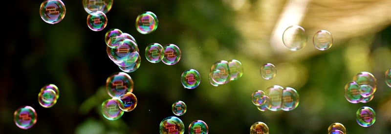 Transparent soap bubbles floating in the air